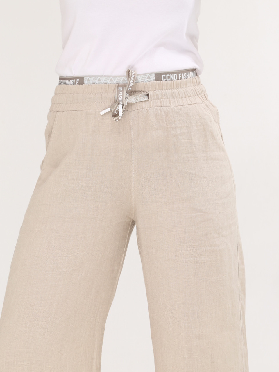 Штани жіночі бежеві лляні палаццо на кулісці 2225-1