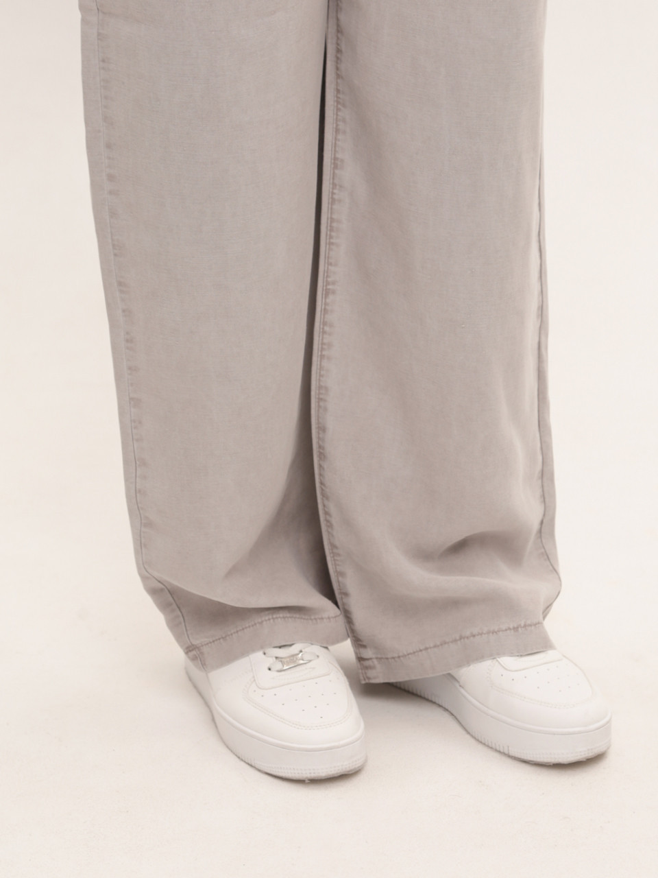 Штани жіночі світло-бежеві тонкі широкі з гумкою на пояс 7739-1