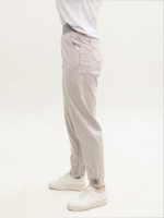 Джинсы женские тонкие светло-бежевые бананы на резинке 8040-B-1